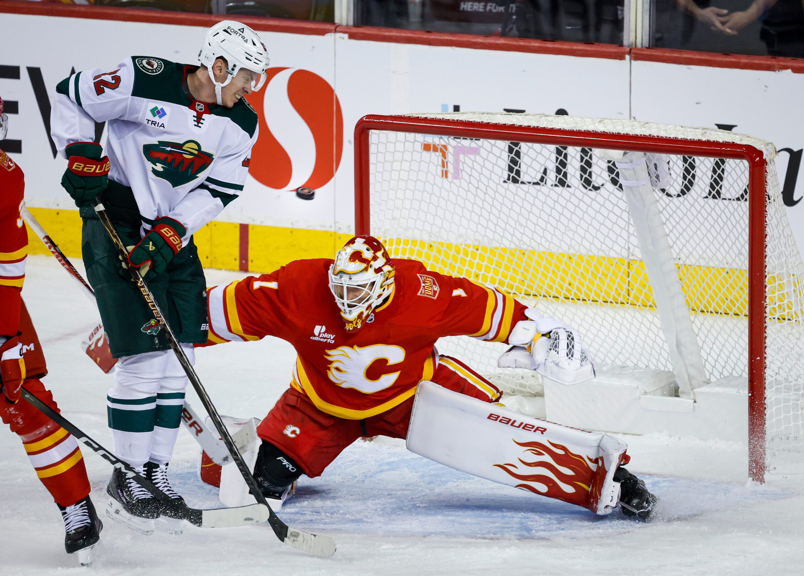Cooley makes 36 saves in the Flames’ 2-1 victory over the Wild — KSTP 5, Hastings Sports news